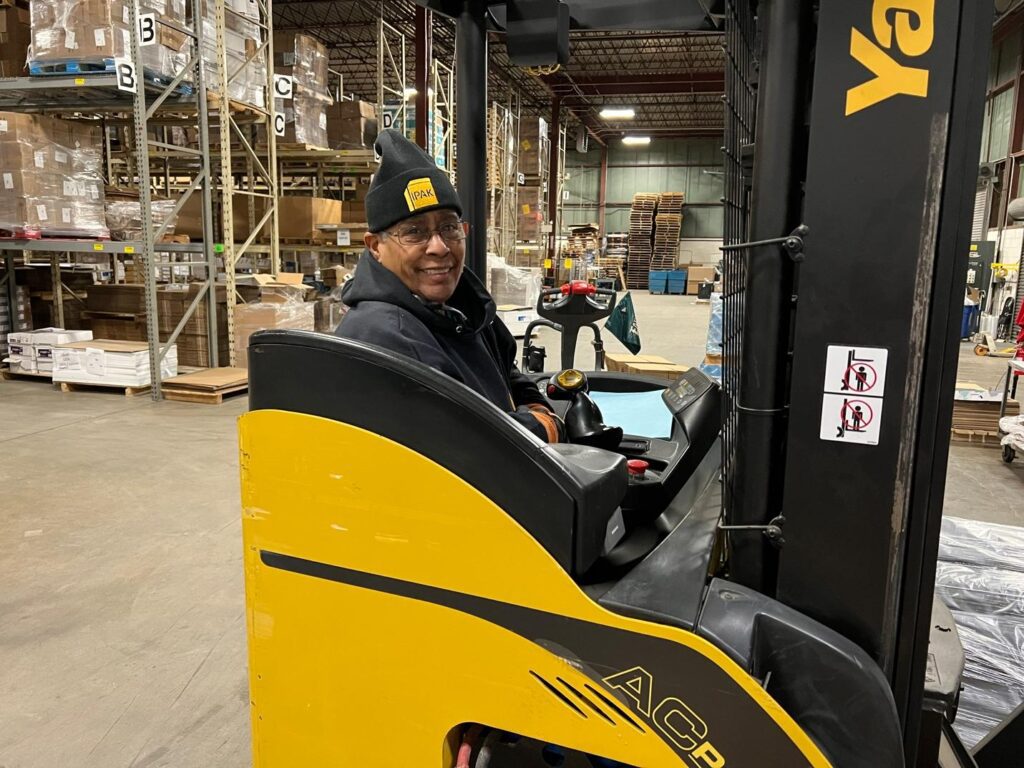 Employee using forklift