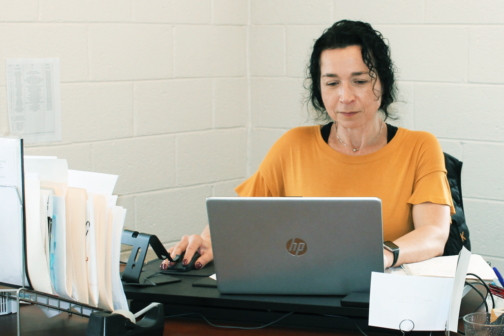 Woman working at laptop computer