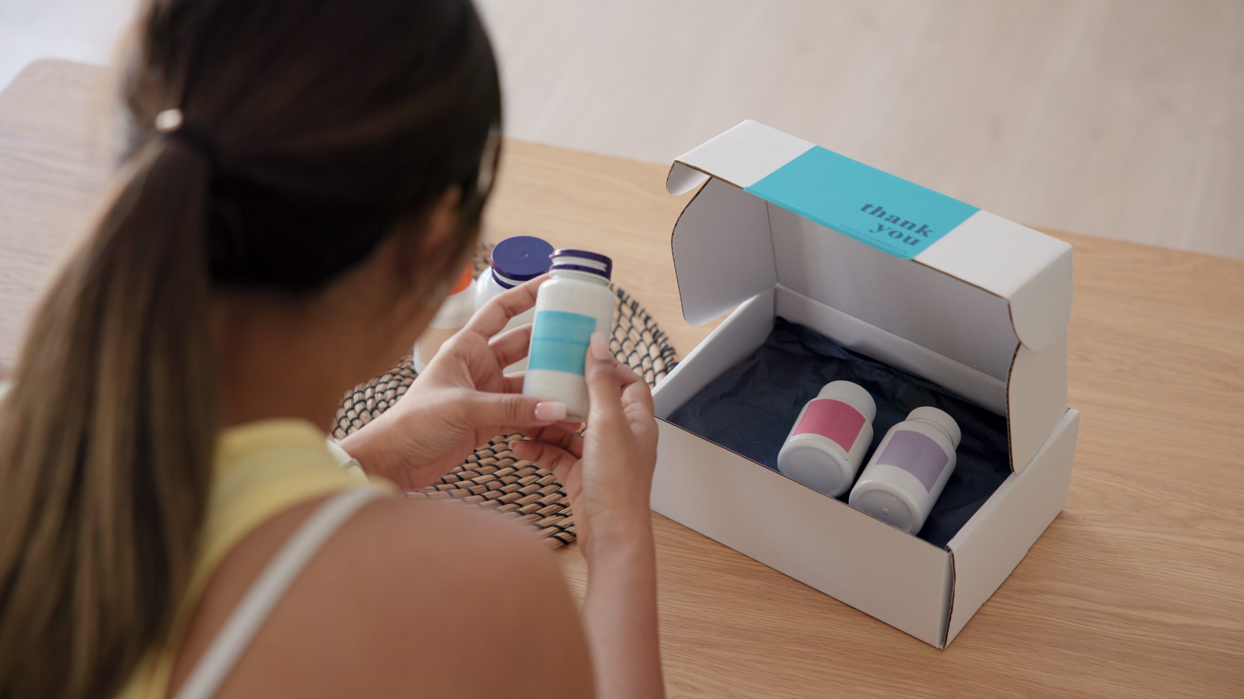 Young asia people woman buy custom tailor made anti aging pill bottle diet immune plan online health care shop open gift box weight loss herbal. Unbox order store clinic home service life balance.