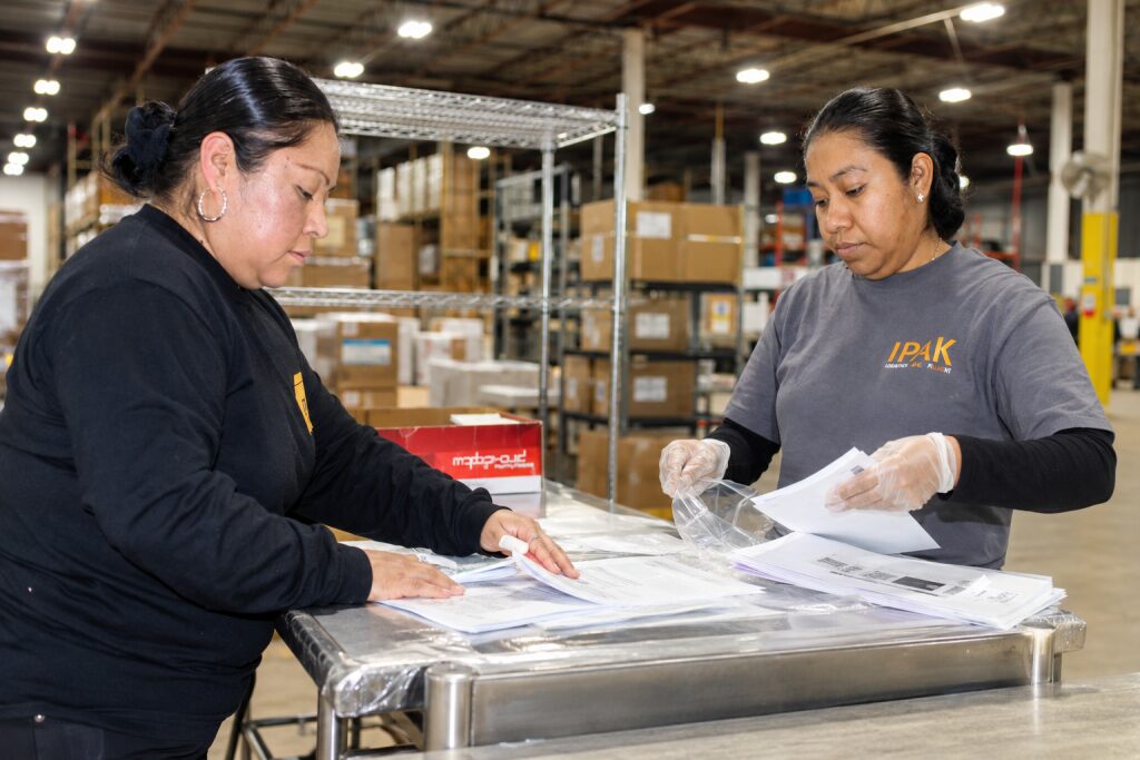 IPAK workers sorting papers